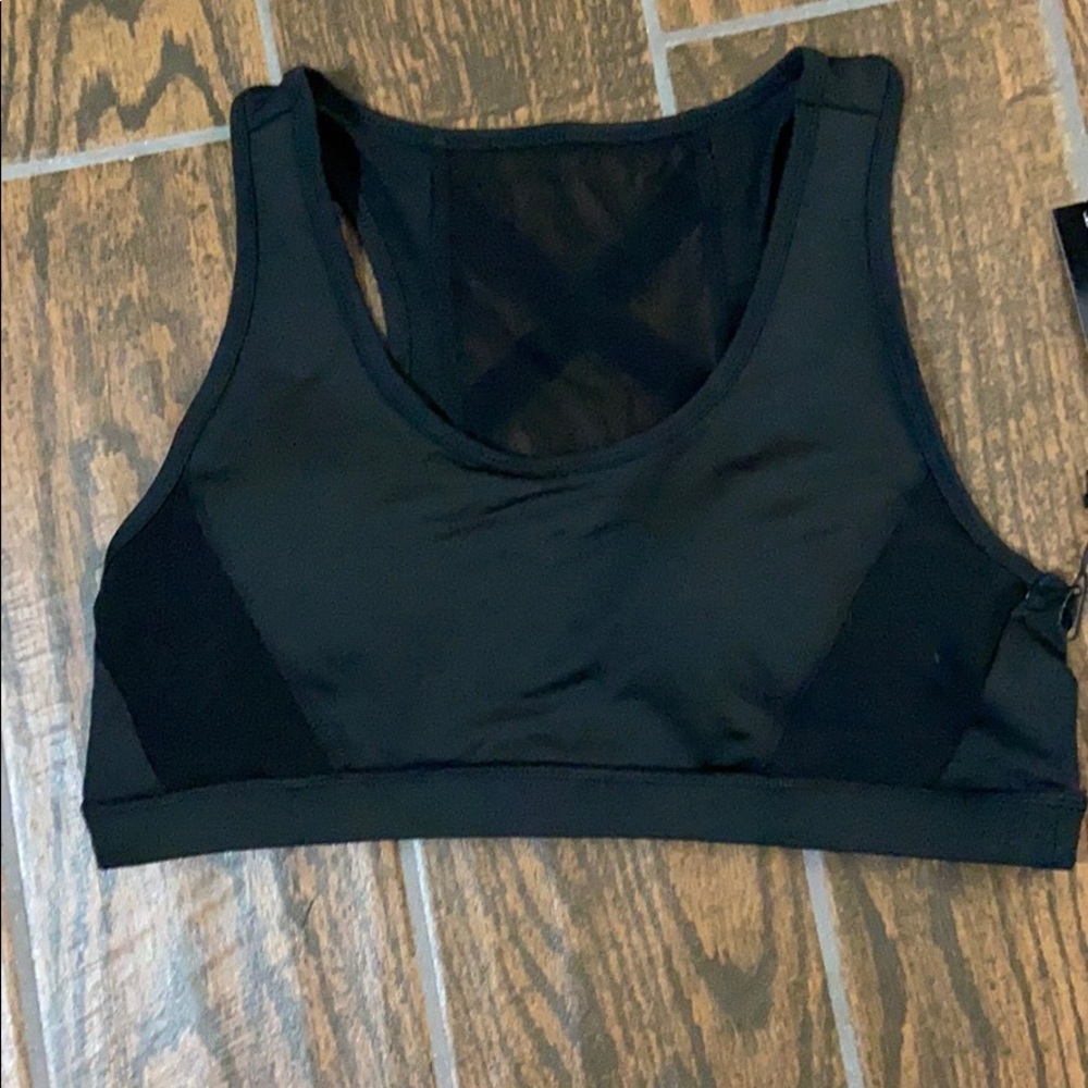 Black sports bra with mesh criss cross design